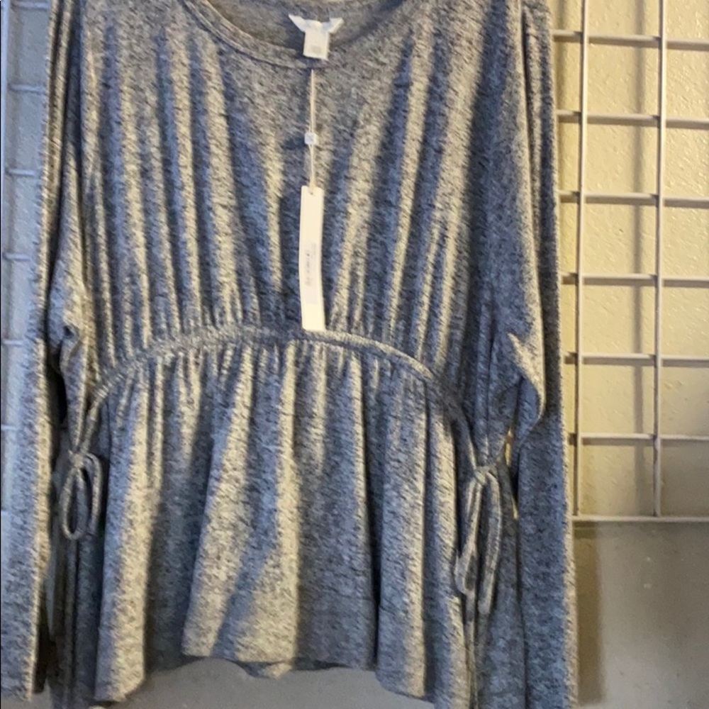 A gray blouse